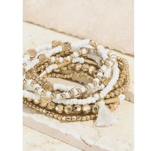 White twelve strand stretch bracelet bundle